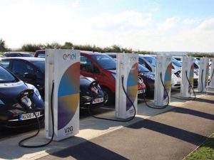 Row of V2G chargers and Nissan LEAFs